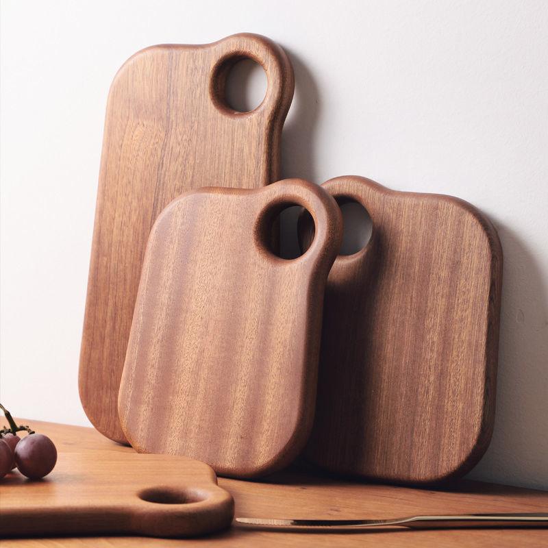 Designer solid wood cutting board